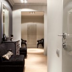 One bedroom apartment with Ralph Lauren wallpaper and designer furniture